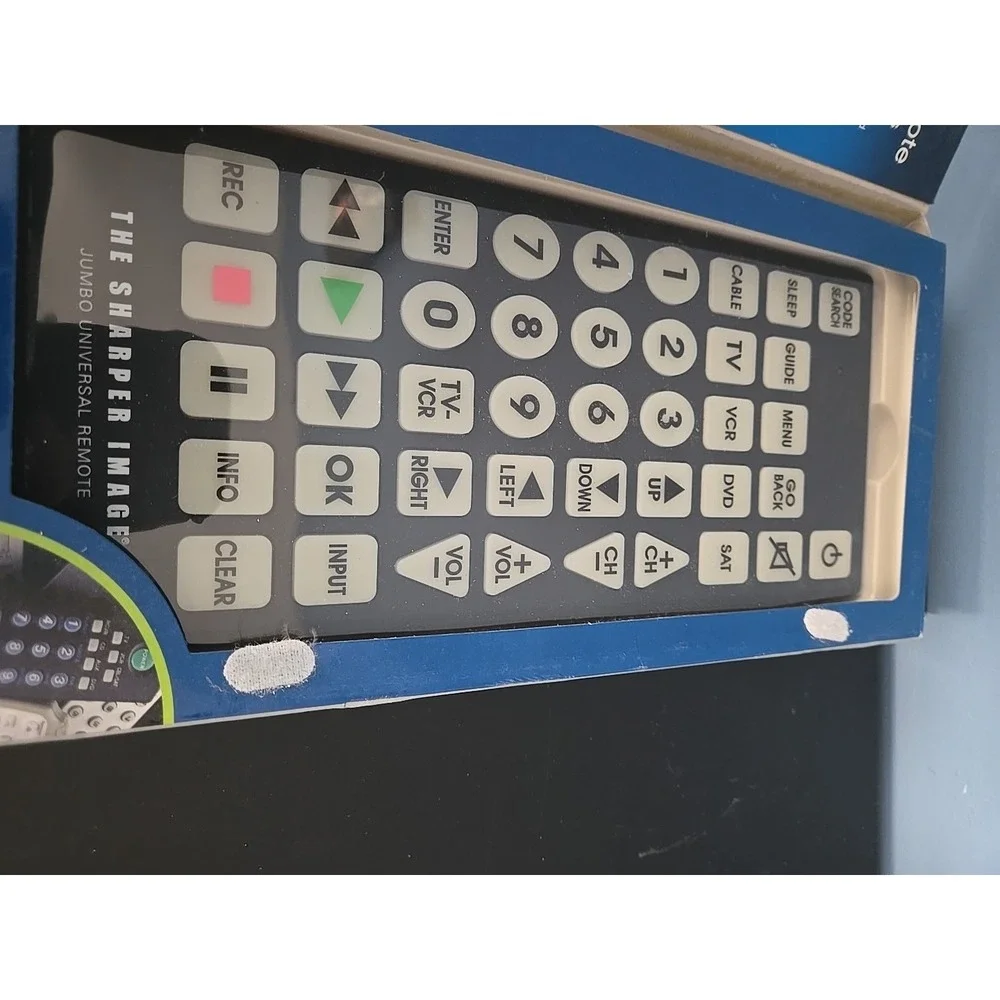 The Sharper Image Jumbo Universal Remote Glow In The Dark Keys